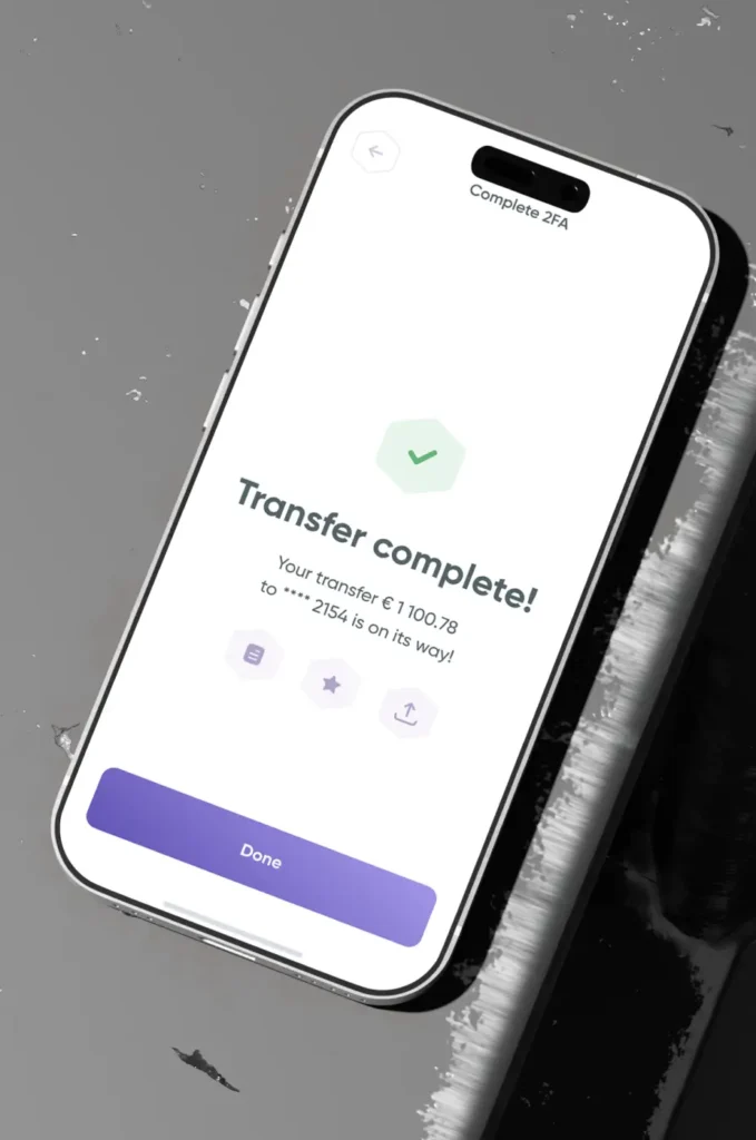 Banxe app Transfer complete screen with a green hexagon check, the transfer amount and Done button